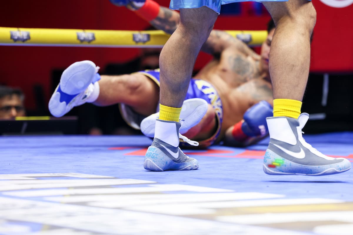 Ryan Garcia suffers a knockdown during his bout against Rolando Romero