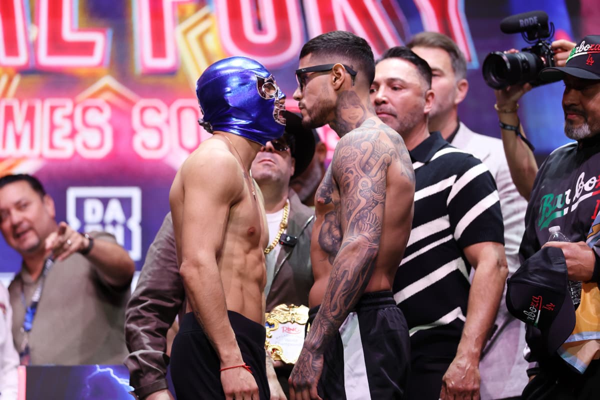 Teofimo Lopezand Arnold Barboza Jr face off at the weigh-in