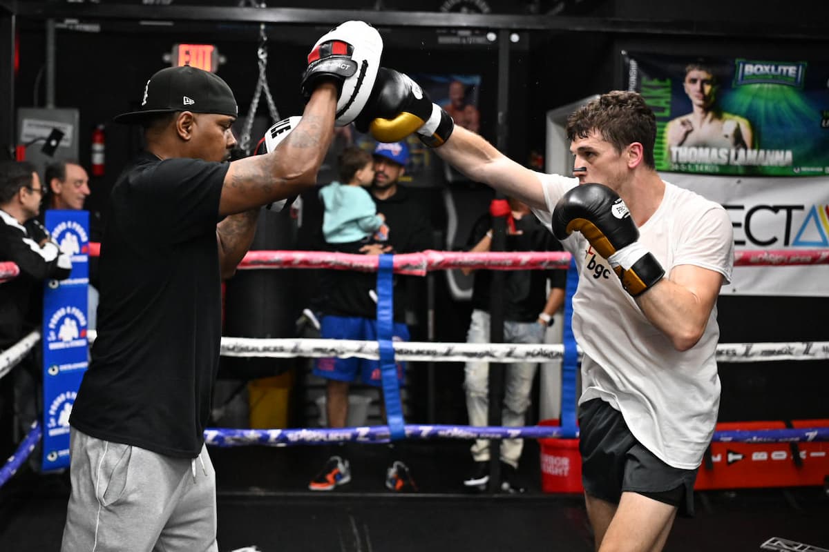 Thomas LaManna punches mitts during a media workout