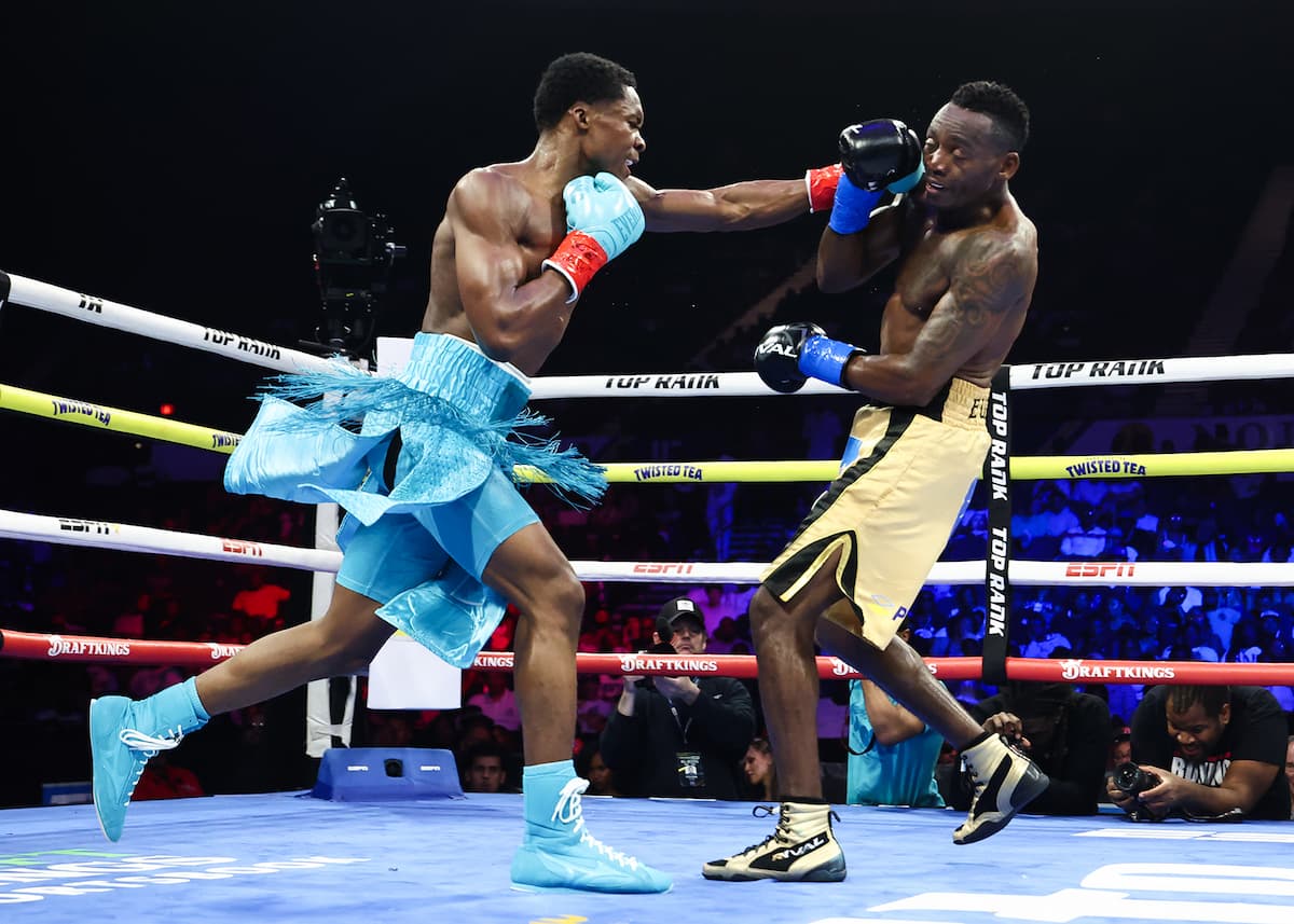 Abdullah Mason punches Jeremia Nakathila during their bout in Norfolk, VA
