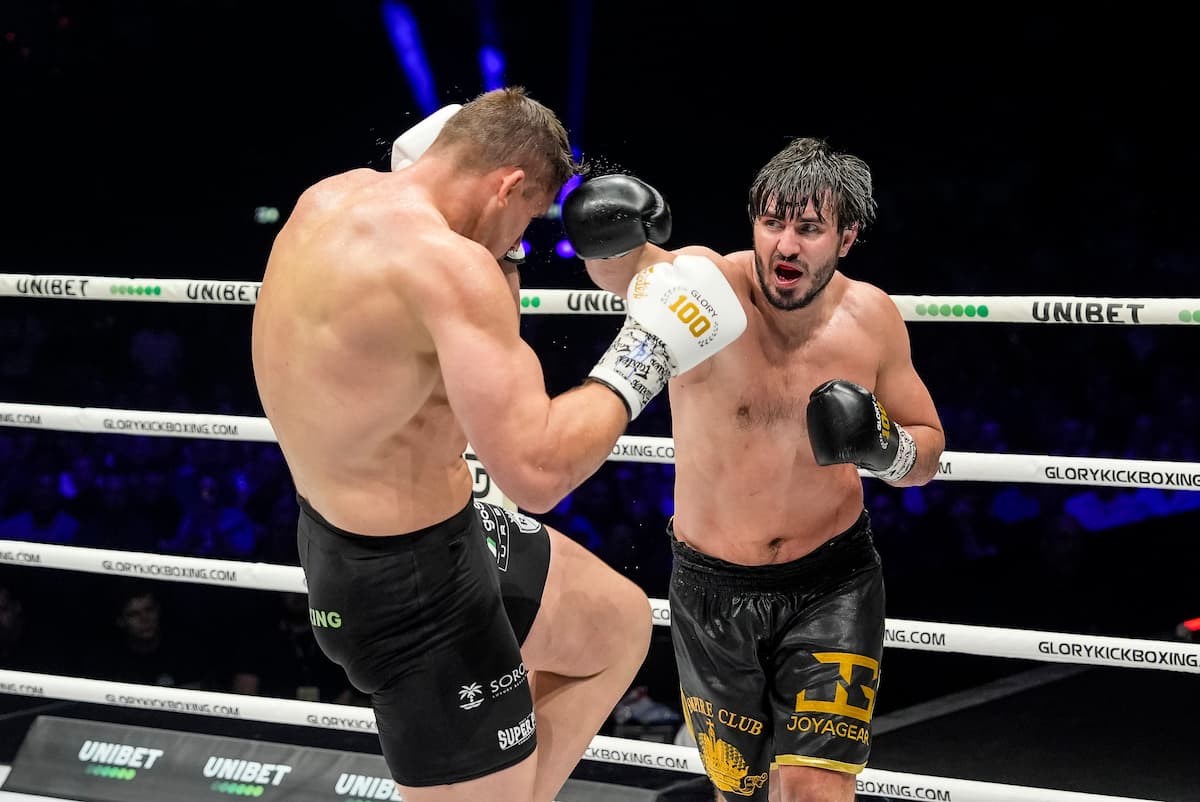 Artem Vakhitov throws a punch during his bout against Rico Verhoeven at Glory 100