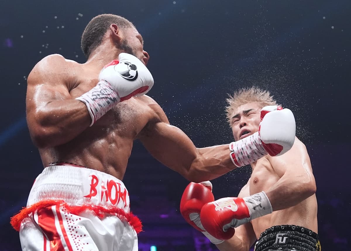 Brian Norman Jr throws a left hook during his boxing bout against Jin Sasaki in Tokyo