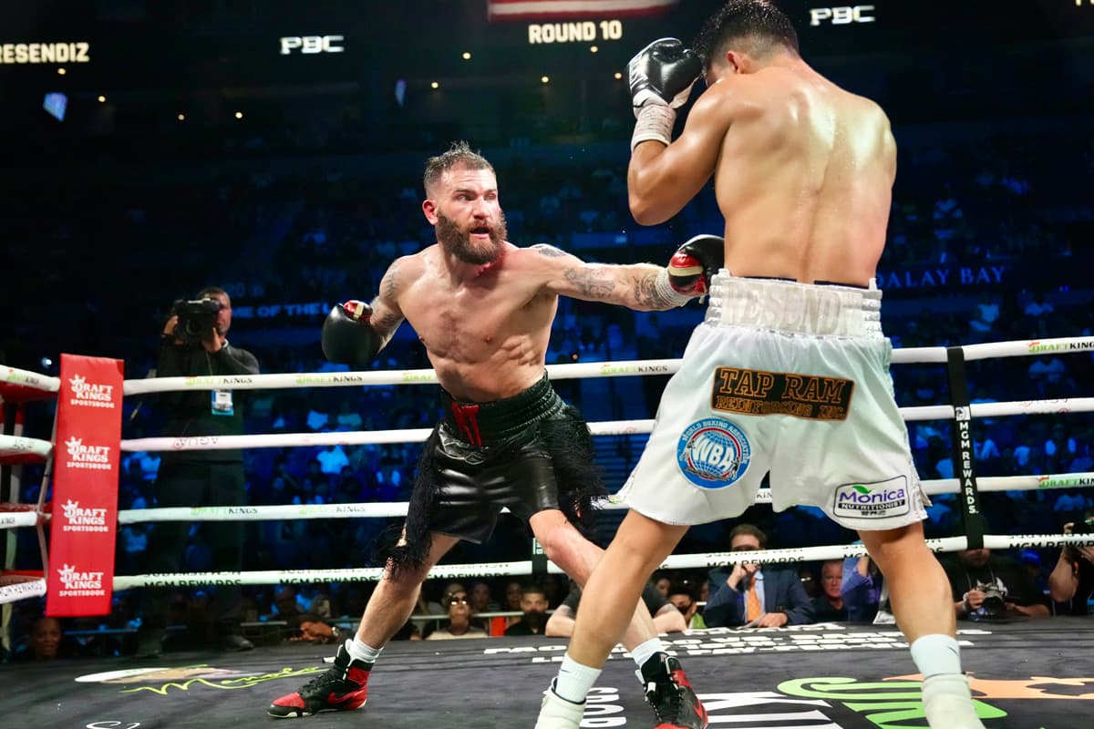 Caleb Plant punches Armando Resendiz during their boxing bout in Las Vegas