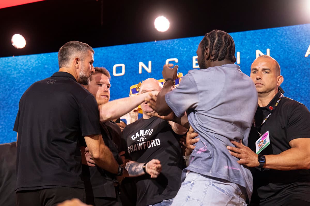 Canelo Alvarez and Terence Crawford clash during the press conference at the 2025 Fanatics Fest NYC