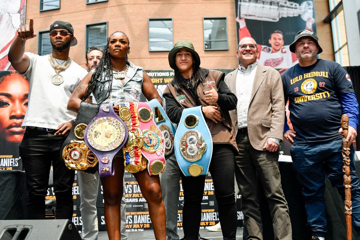 Claressa Shields and Lani Daniels with their team members at the press conference ahead of their bout in Detroit, MI