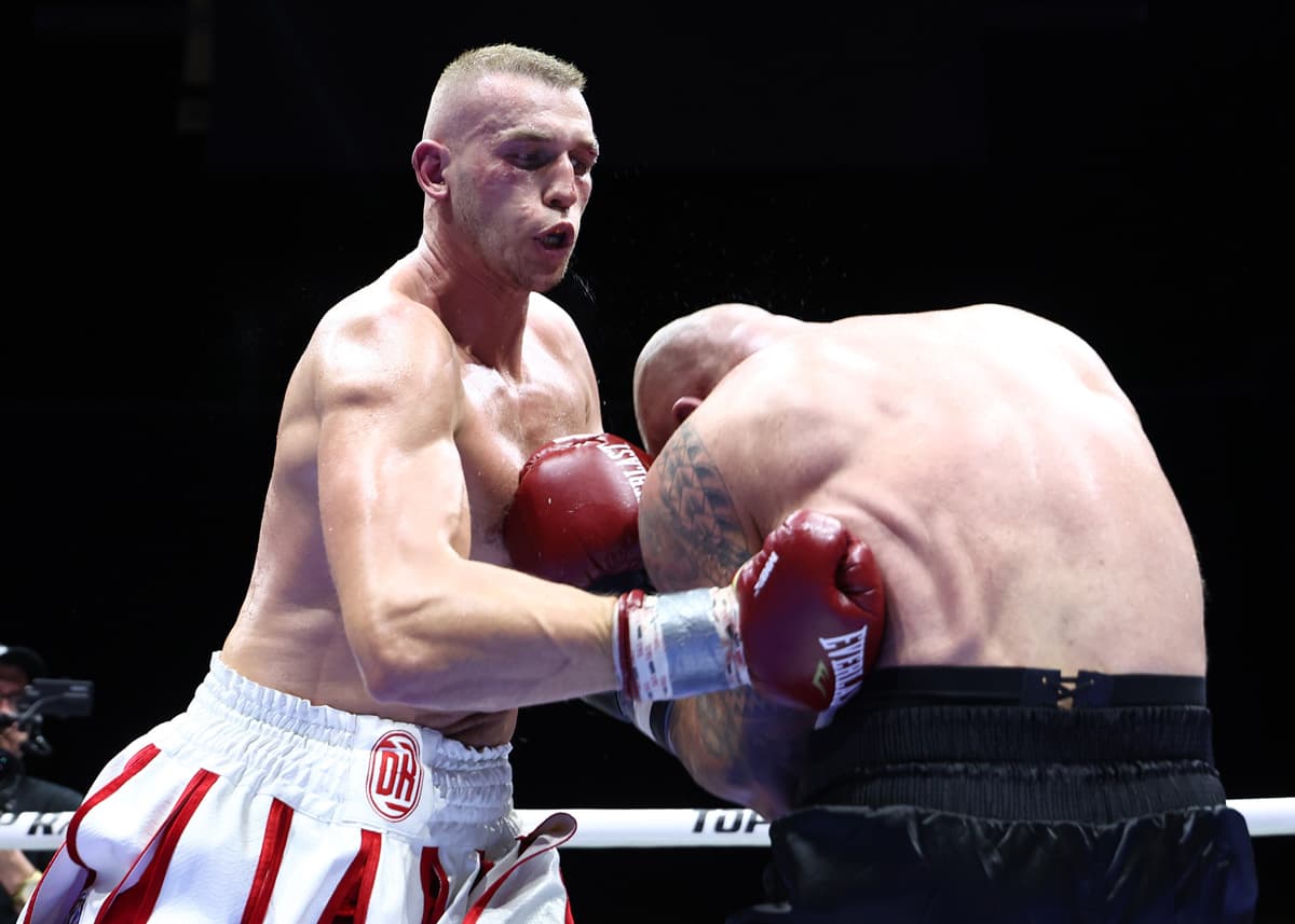 Damian Knyba punches Marcin Siwy during their boxing bout in Newark, New Jersey