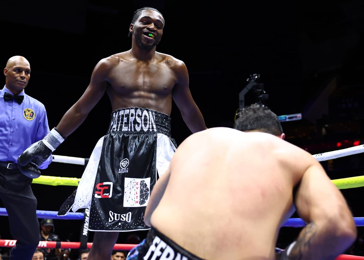 Dwyke Flemmings Jr knucks down Demian Daniel Fernandez during their boxing bout in Newark, New Jersey