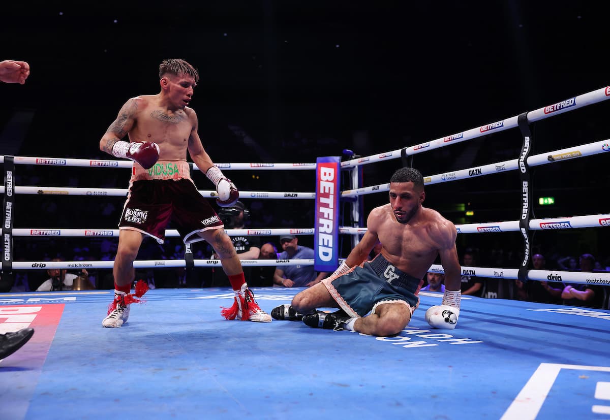 Francisco Rodriguez Jr knocks down Galal Yafai during their boxing bout in Birmingham, England