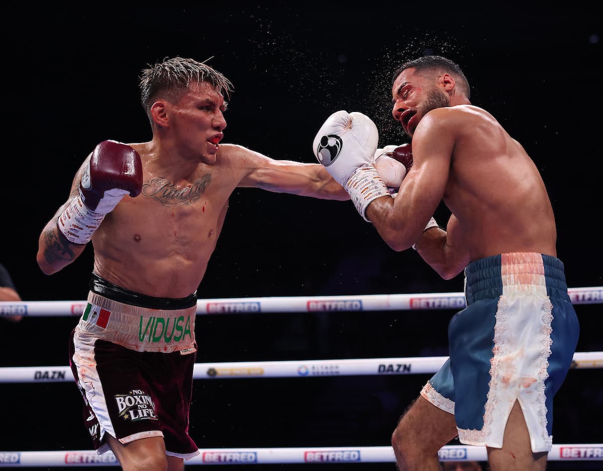 Francisco Rodriguez Jr punches Galal Yafai during their boxing bout in Birmingham, England