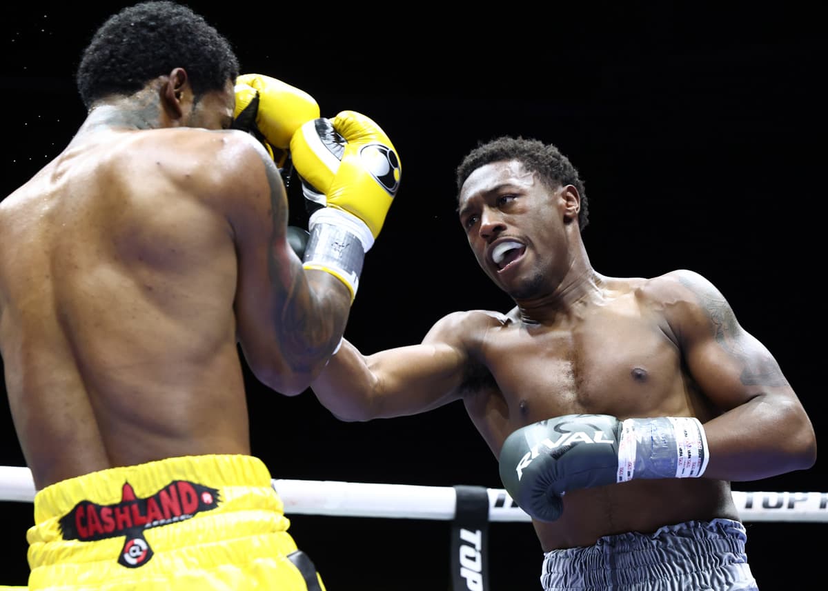 Jahi Tucker punches Lorenzo Simpson during their boxing bout in Newark, New Jersey