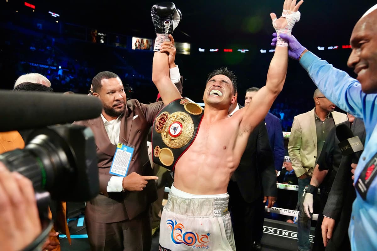 Jose Armando Resendiz victorious over Caleb Plant during their boxing bout in Las Vegas
