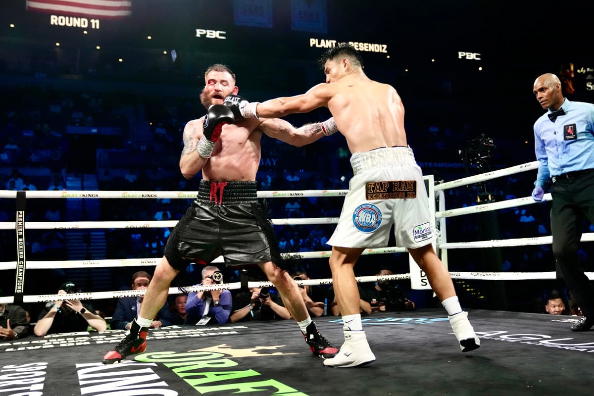 Jose Armando Resendiz lands a jab during his bout against Caleb Plant in Las Vegas
