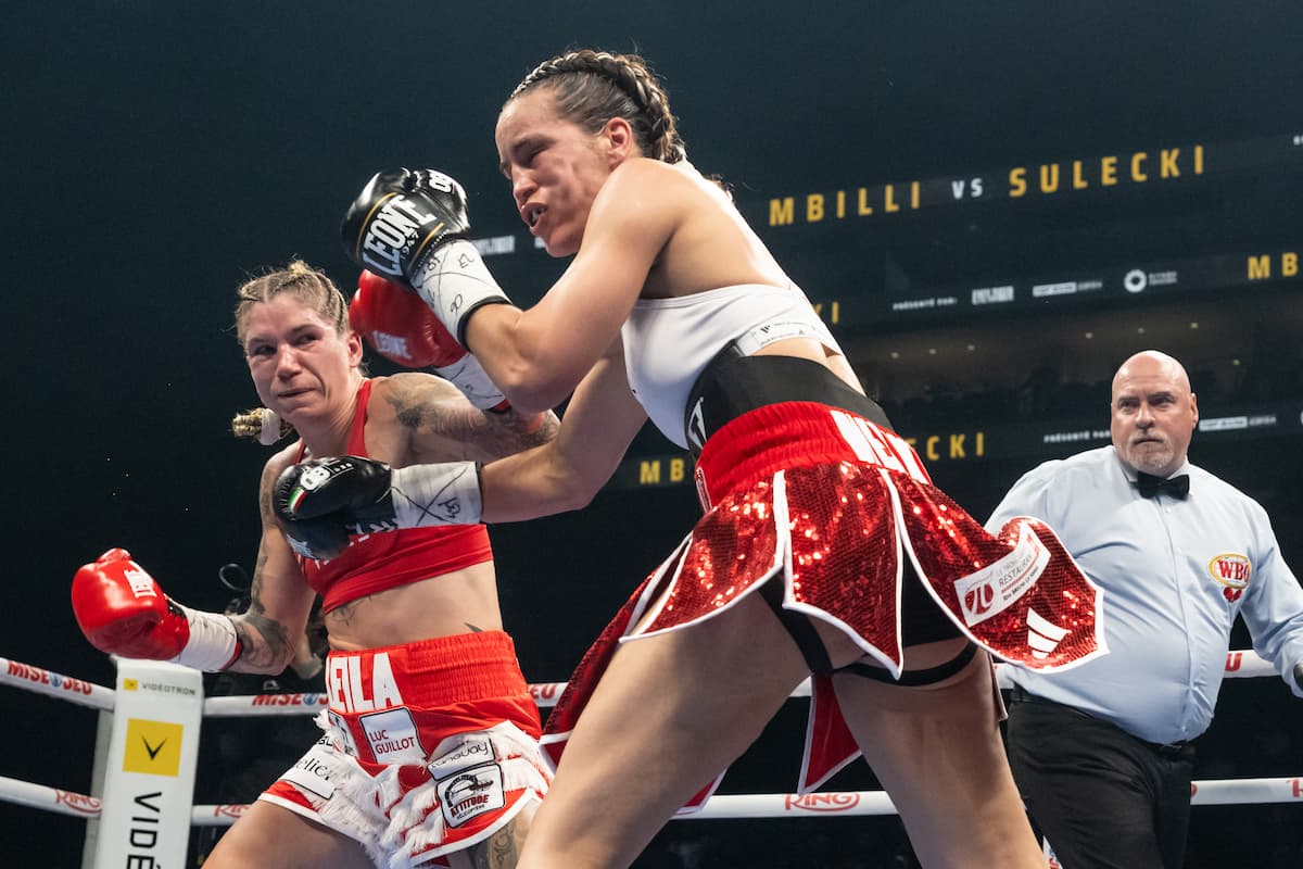 Leila Beaudoin punches Elhem Mekhaled during their boxing bout in Québec City, Canada