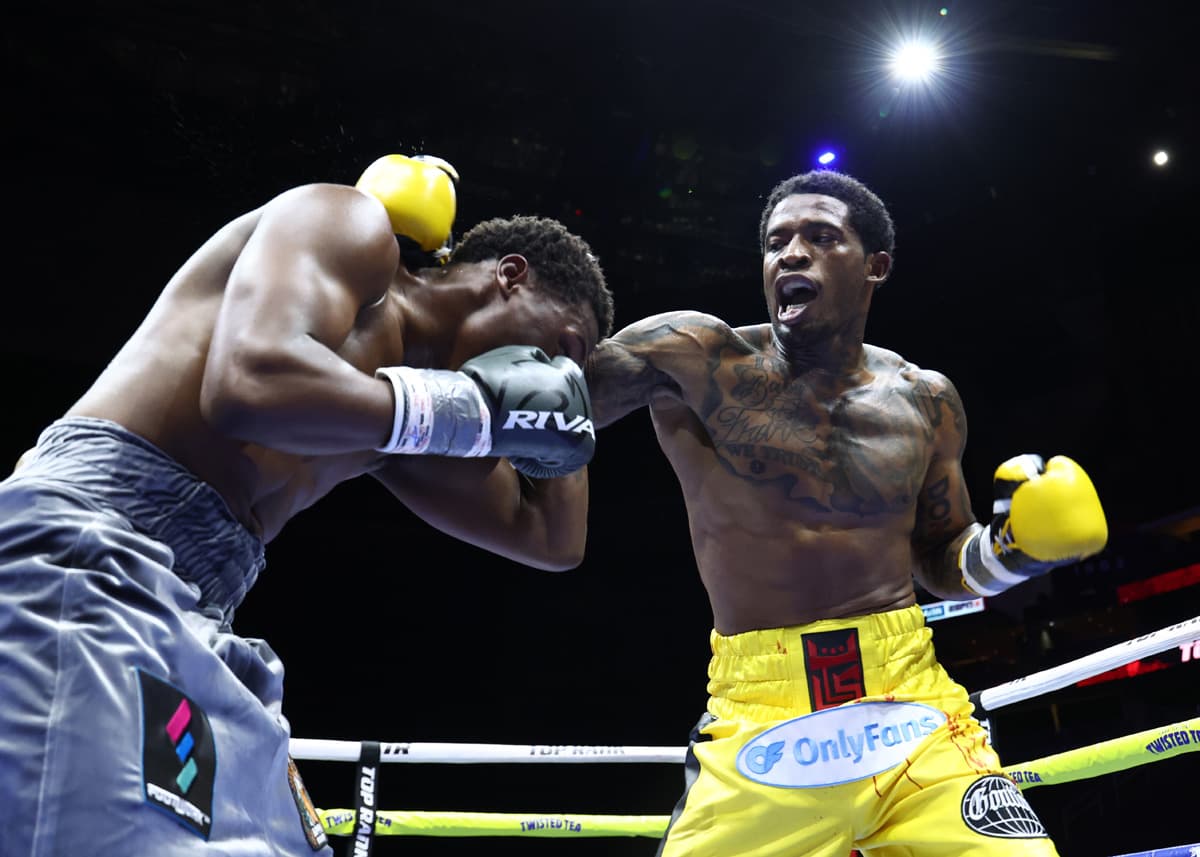 Lorenzo Simpson punches Jahi Tucker during their boxing bout in Newark, New Jersey