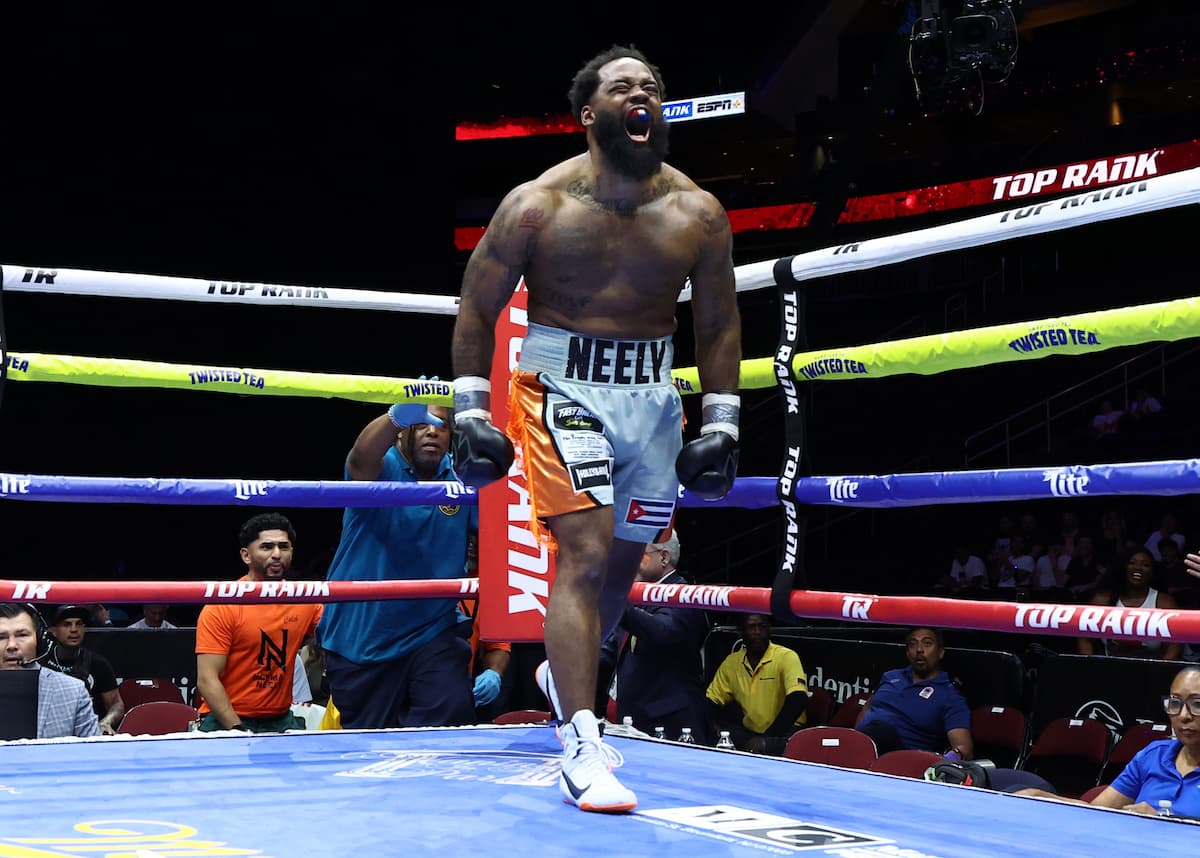 Norman Neely celebrates victory over James Willis during their boxing bout in Newark, New Jersey