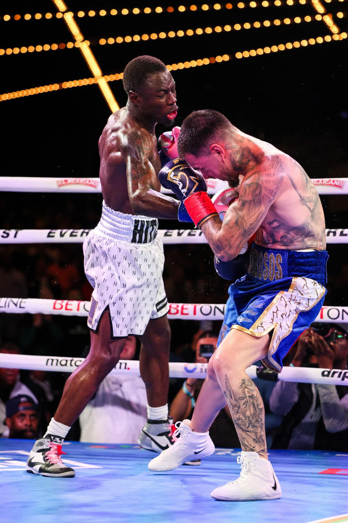 Richardson Hitchins punches George Kambosos Jr during their bout at The Theater at MSG in New York