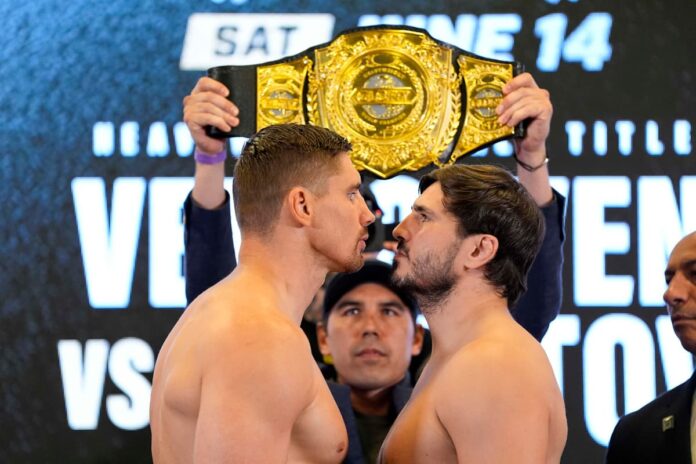 Rico Verhoeven and Artem Vakhitov come face-to-face at the Glory 100 weigh-in ahead of their kickboxing bout at the Ahoy Rotterdam in the Netherlands