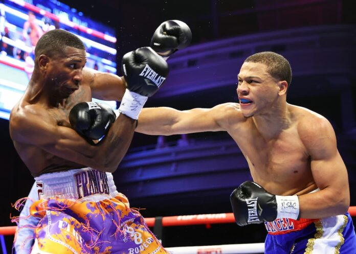 Rohan Polanco throws a punch during his boxing bout against Cesar Francis in Las Vegas