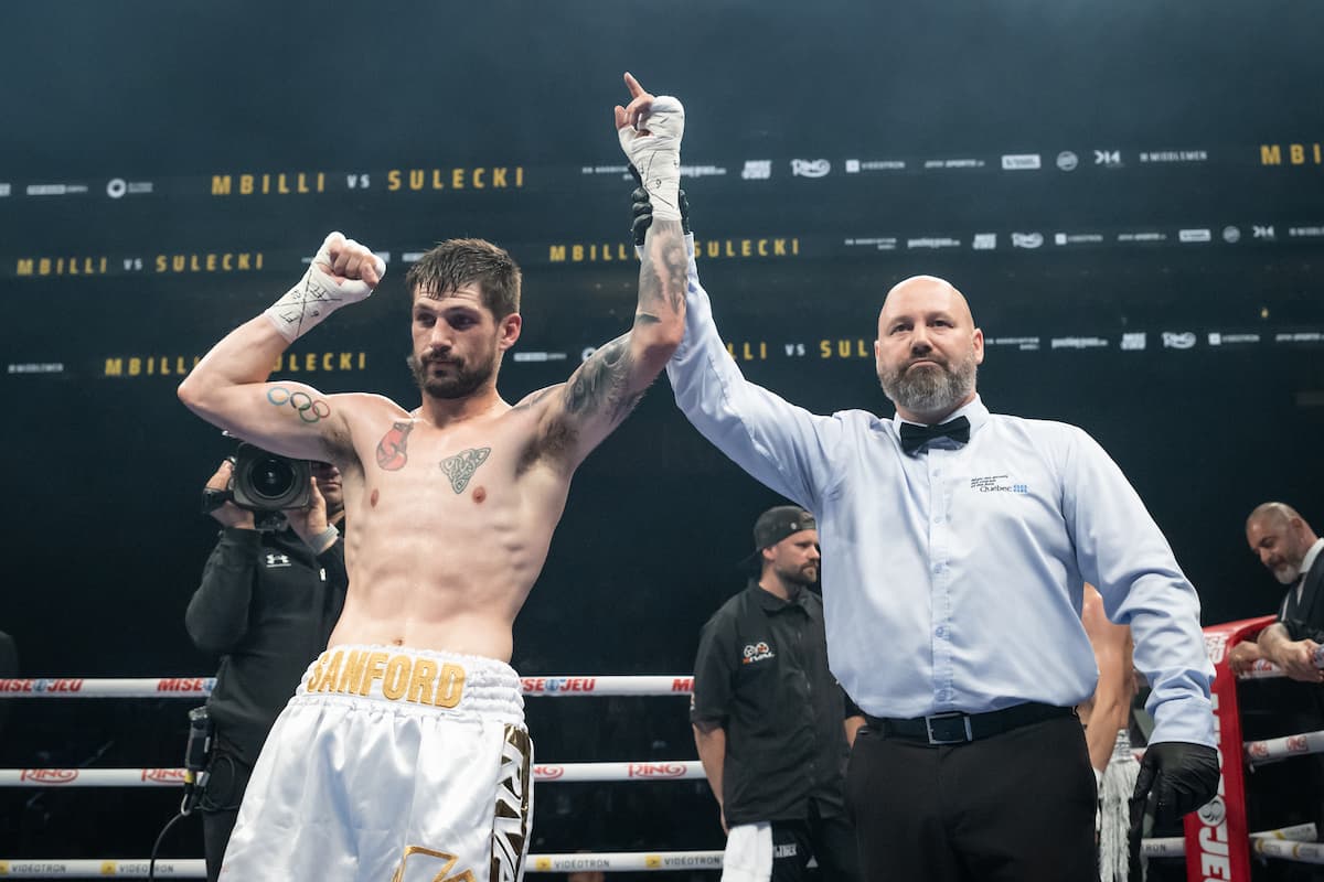 Wyatt Sanford victorious over Mark Andrejev during their boxing bout in Québec City, Canada