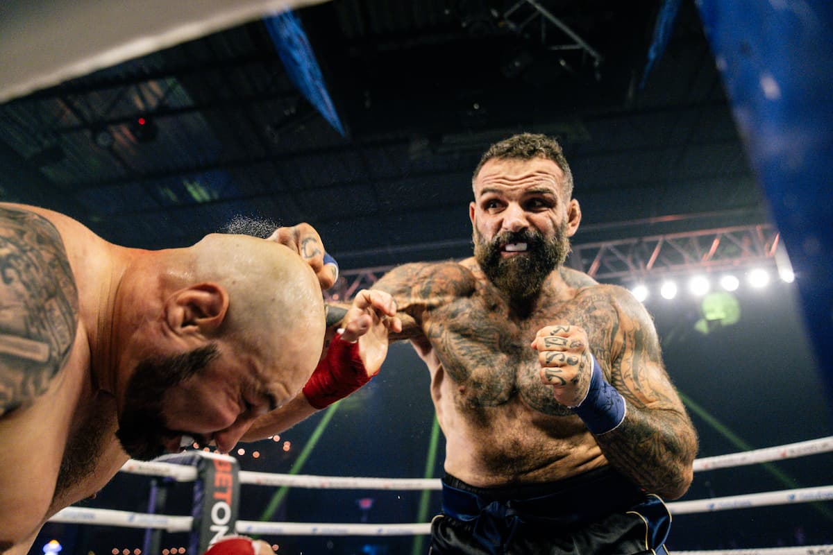 Alessio Sakara punches Erick Lozano during their bare-knuckle boxing bout at BKFC Philly