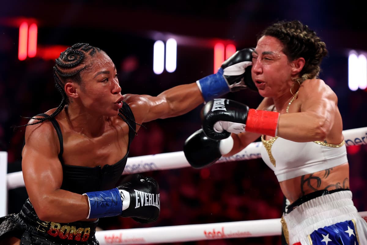 Alycia Baumgardner punches Jennifer Miranda during their boxing bout at MSG in New York