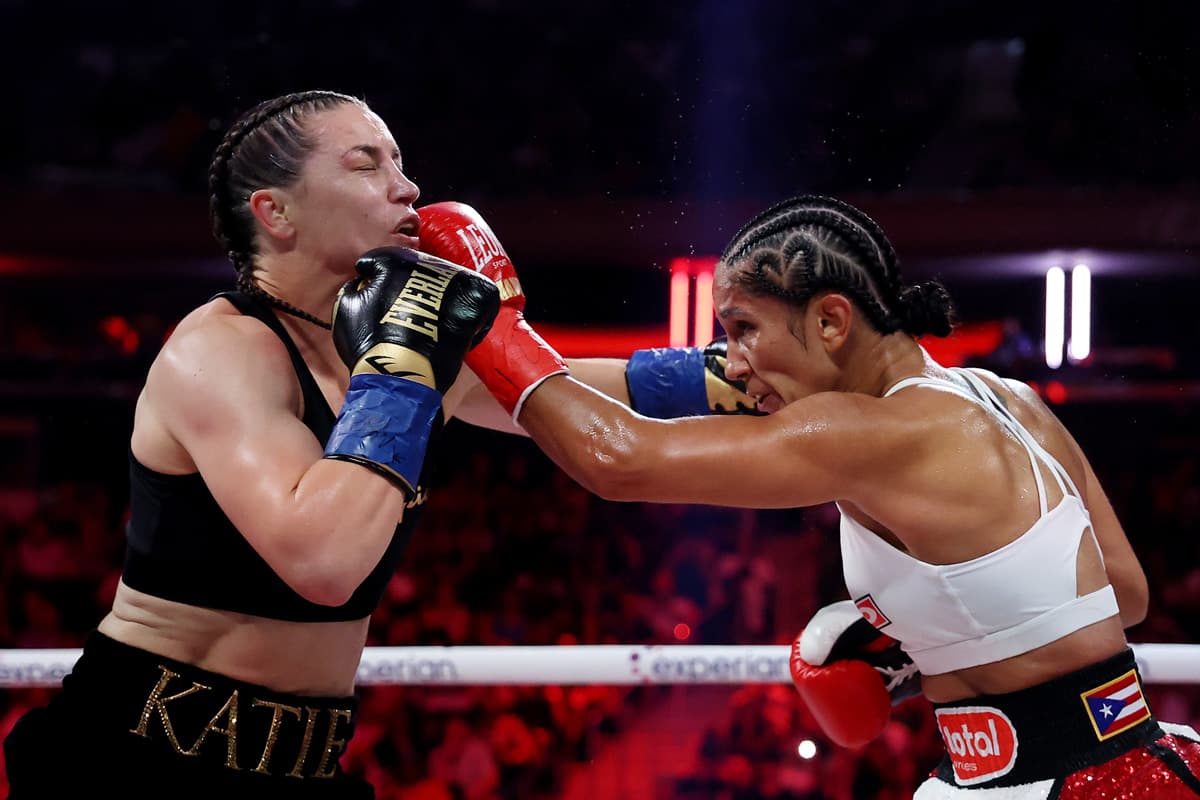 Amanda Serrano punches Katie Taylor during their boxing bout at MSG in New York
