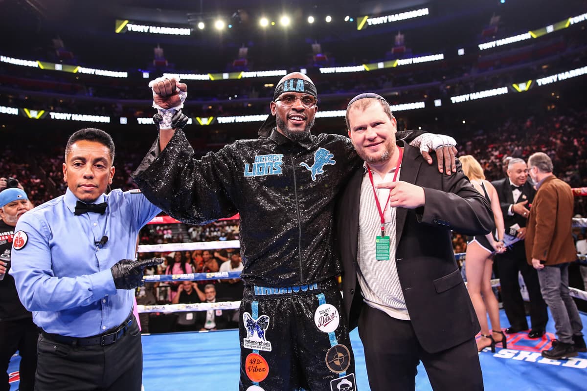 Referee Benjamin Rodriguez, boxer Tony Harrison, and promoter Dmitry Salita at Little Caesars Arena in Detroit