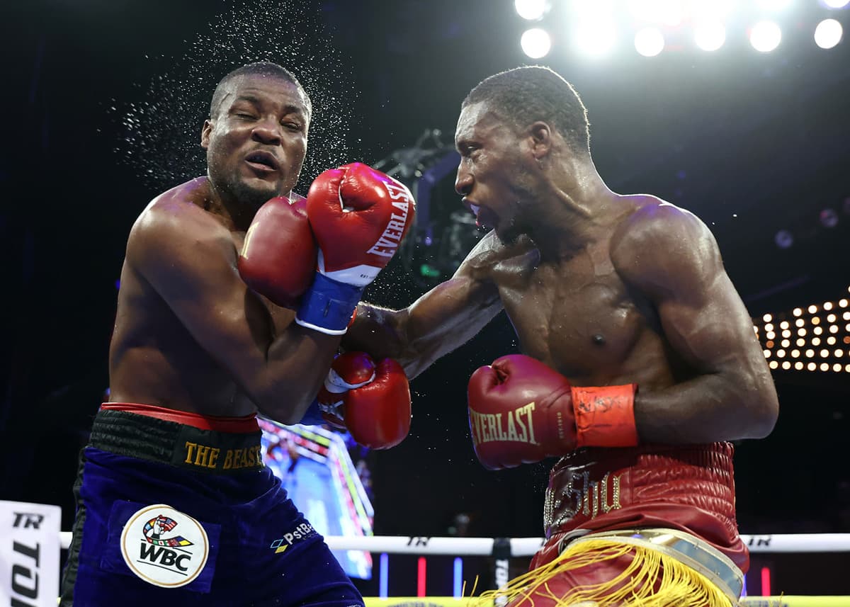 Bruce Carrington punches Mateus Heita during their bout at The Theater at Madison Square Garden in New York