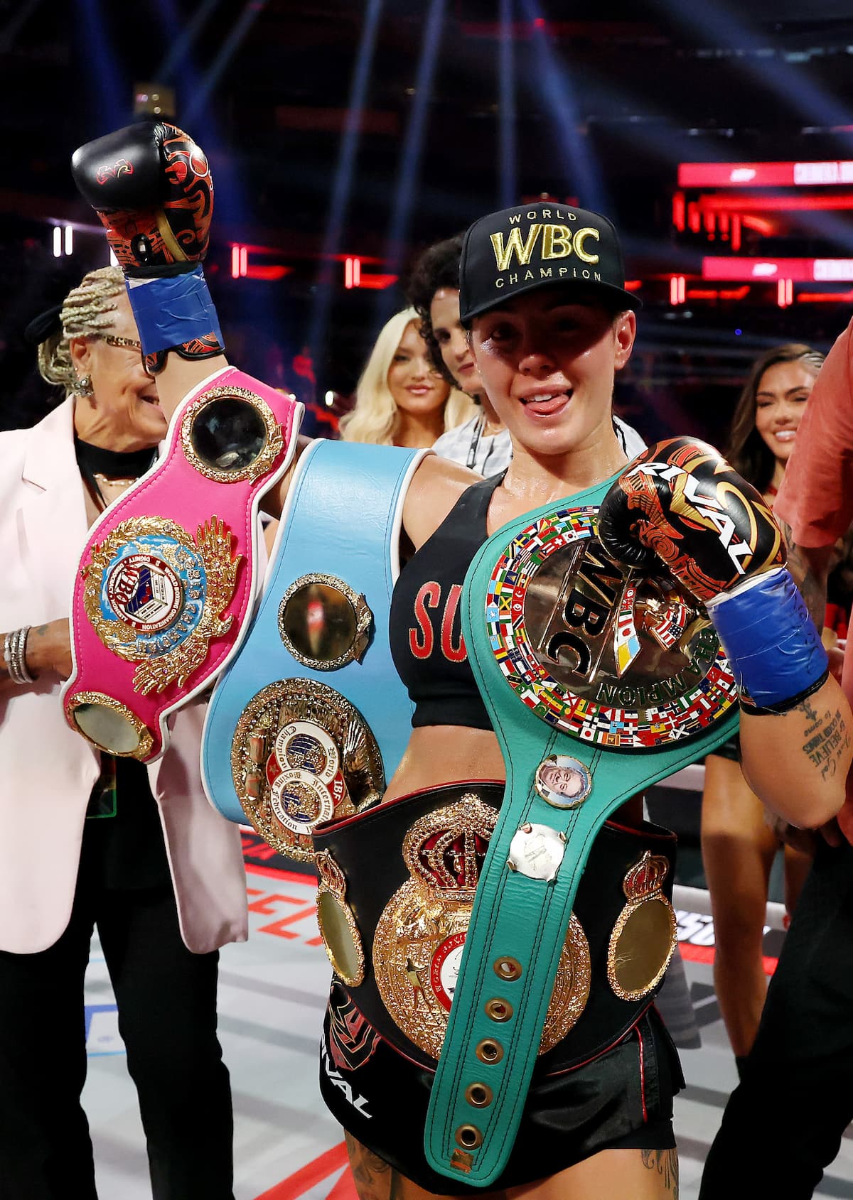 Cherneka Johnson poses with her championship belts after her victory over Shurretta Metcalf at MSG in New York