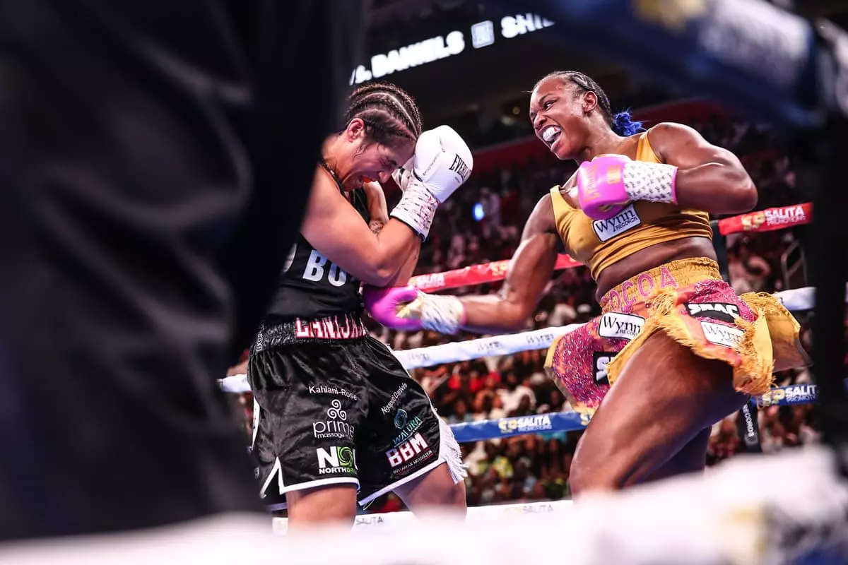 Claressa Shields punches Lani Daniels during their bout at Little Caesars Arena in Detroit