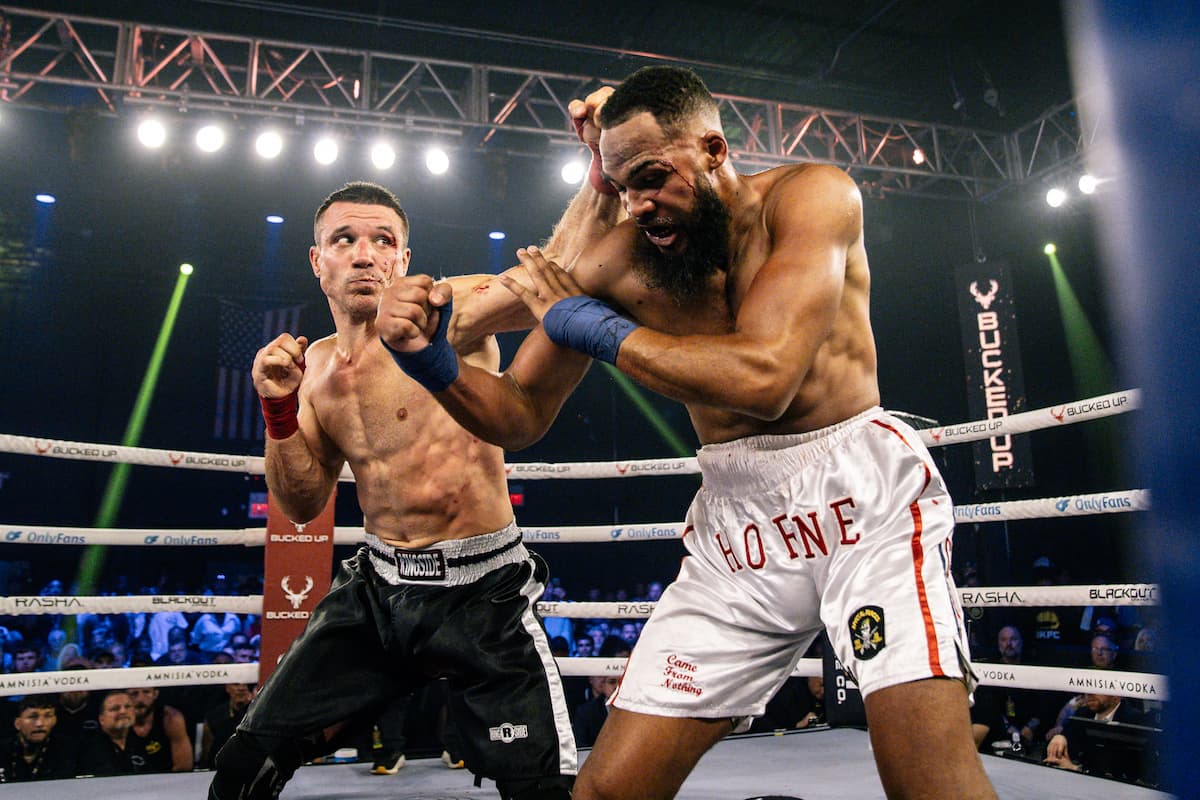 Cody Vidal punches Maurice Horne during their bare-knuckle boxing bout at BKFC Philly
