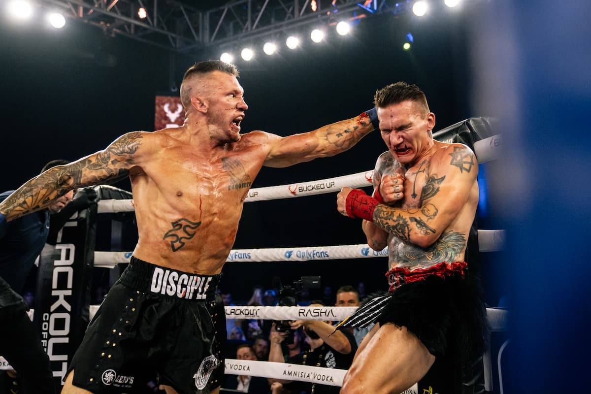 Dustin Pague punches Ryan Petersen during their bare-knuckle boxing bout at BKFC Philly