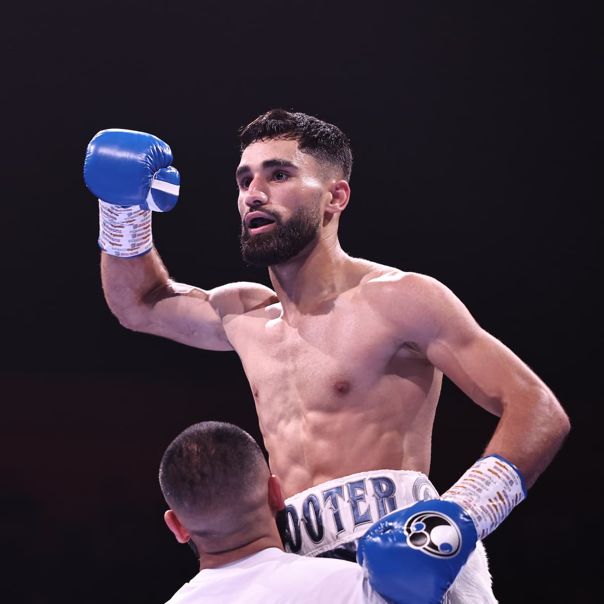 Hassan Ishaq victorious over Brandon Gallardo Vargas during their boxing bout at BIC in Bournemouth, England