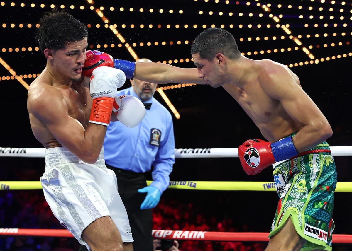 Jorge Garcia Perez punches Xander Zayas during their bout at The Theater at Madison Square Garden in New York