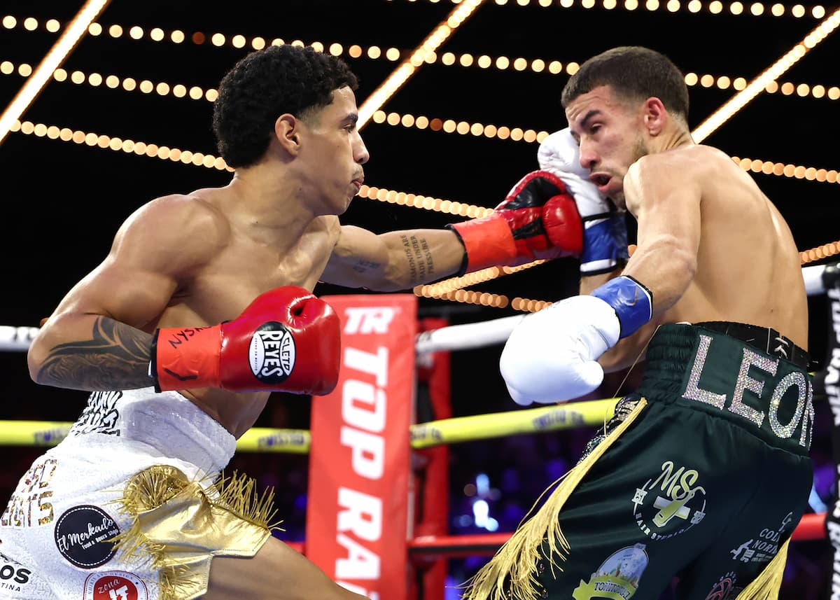 Juanmita Lopez De Jesus punches Jorge Gonzalez-Sanchez during their bout at The Theater at Madison Square Garden in New York