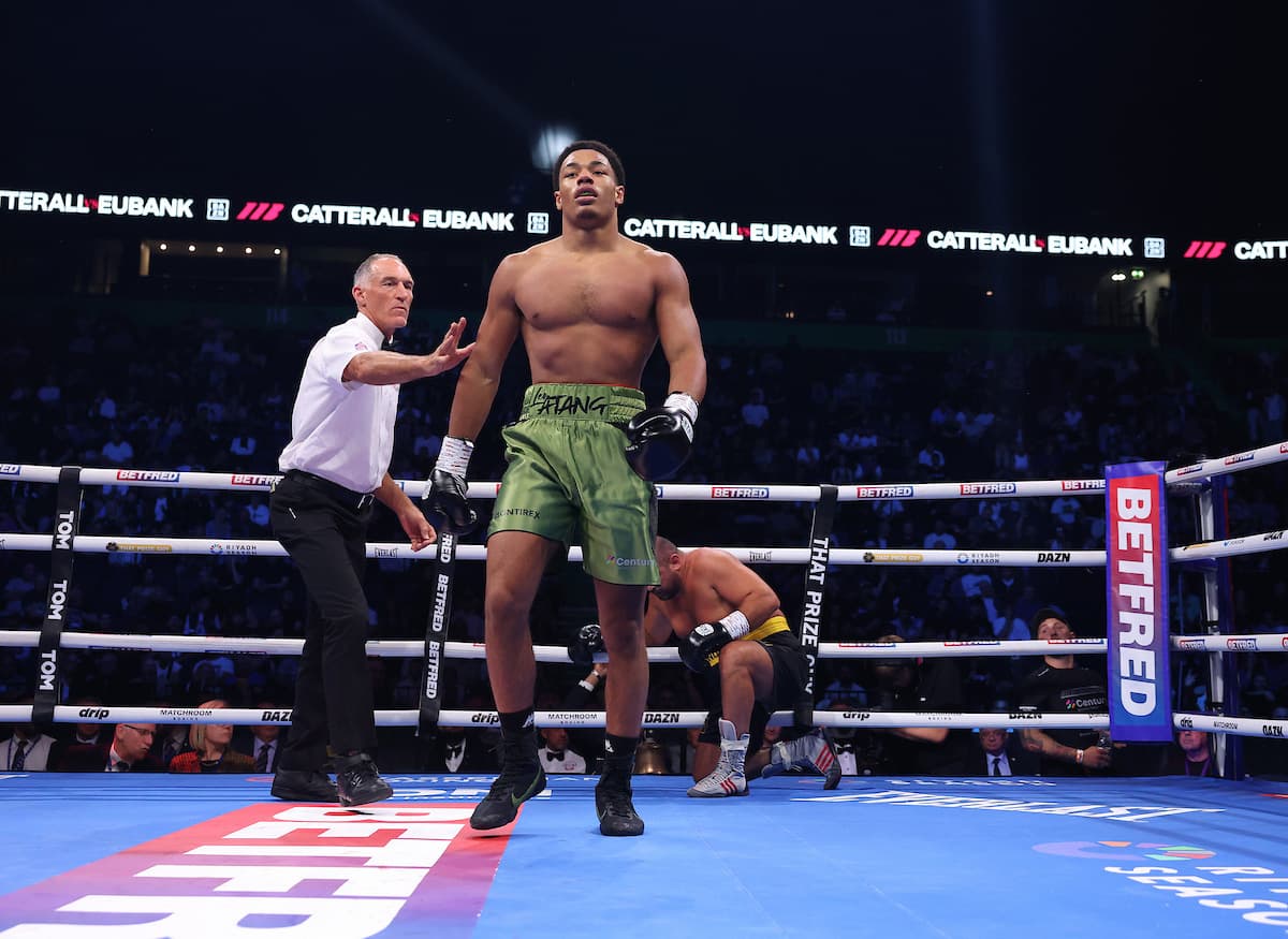 Leo Atang TKOs Milen Paunov during their boxing bout in Manchester