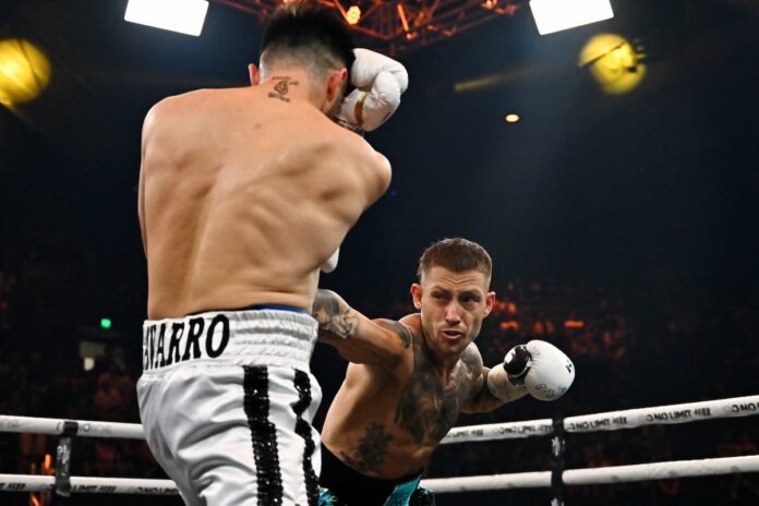 Liam Paro punches Jonathan Navarro during their boxing bout