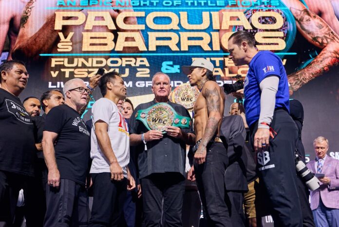Manny Pacquiao and Mario Barrios face off at the weigh-in, ahead of their boxing bout in Las Vegas