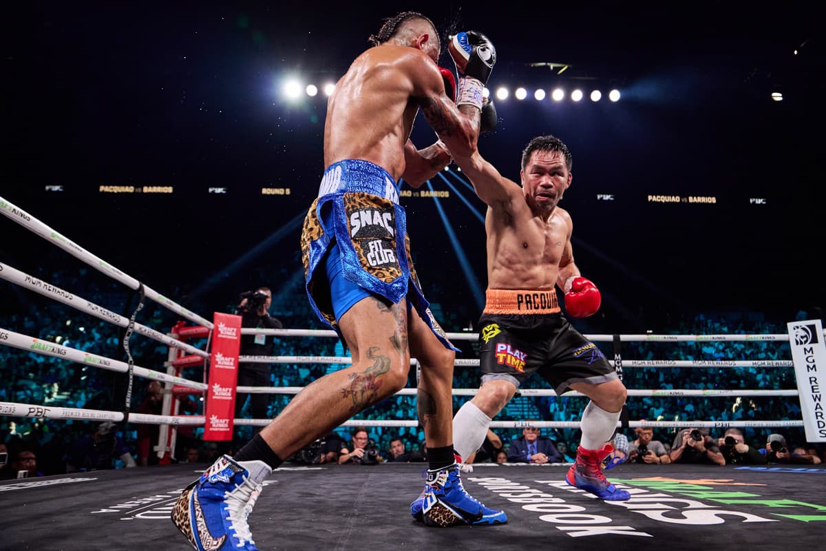 Manny Pacquiao punches Mario Barrios during their bout at the MGM Grand Garden Arena in Las Vegas