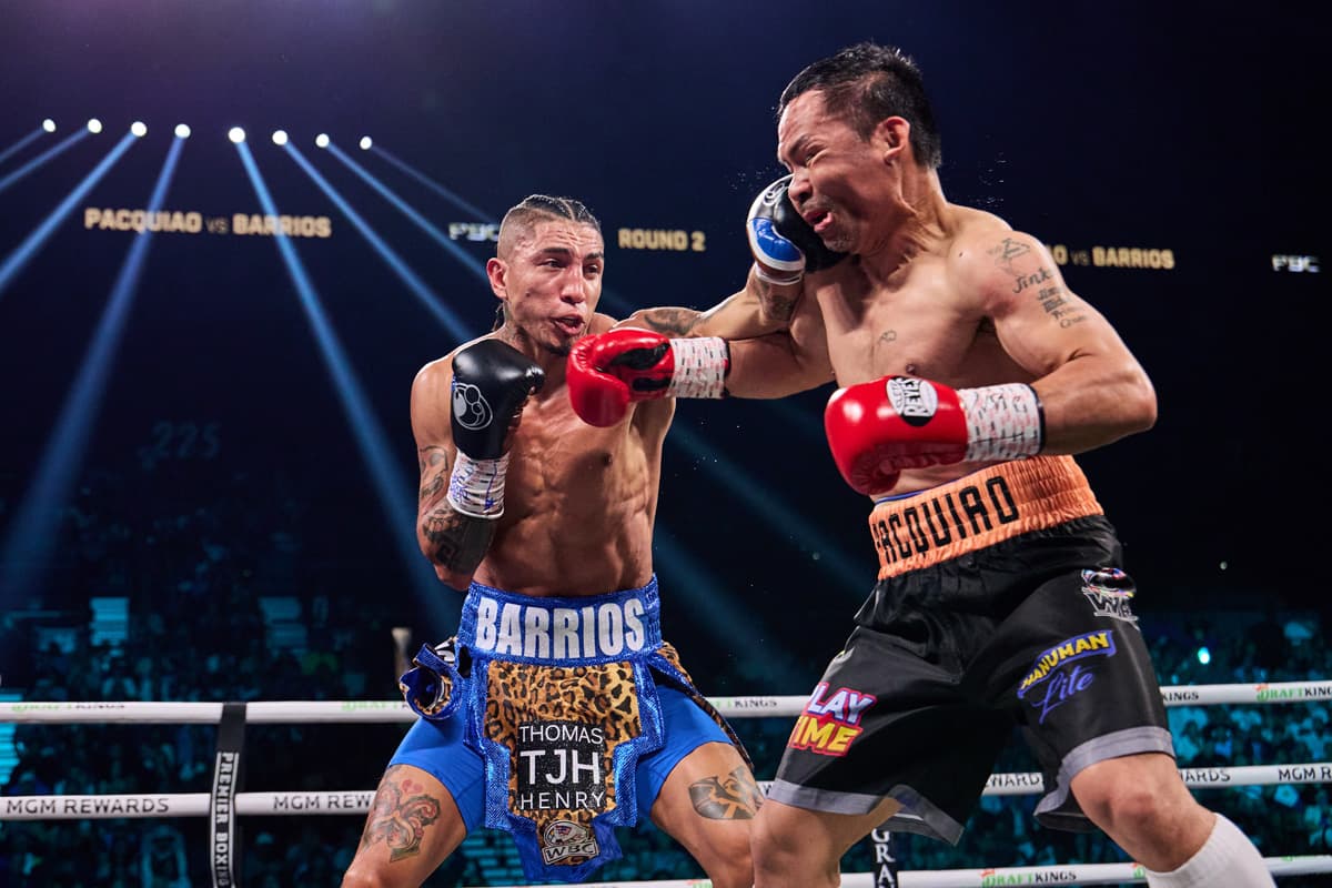 Mario Barrios punches Manny Pacquiao during their bout at the MGM Grand Garden Arena in Las Vegas