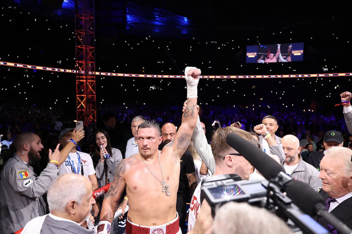 Oleksandr Usyk takes victory over Daniel Dubois during their boxing bout at Wembley Stadium in London