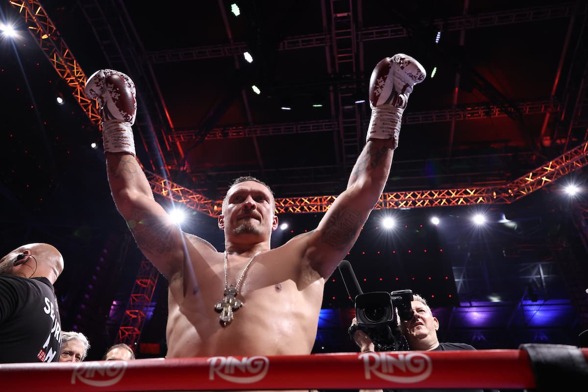 Oleksandr Usyk celebrates victory over Daniel Dubois