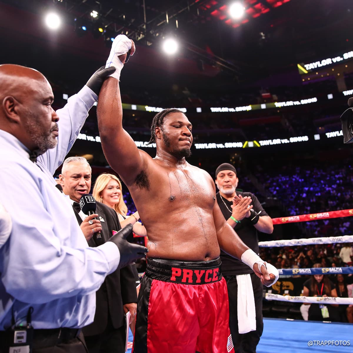Pryce Taylor defeats Robert Simms during their boxing bout at Little Caesars Arena in Detroit