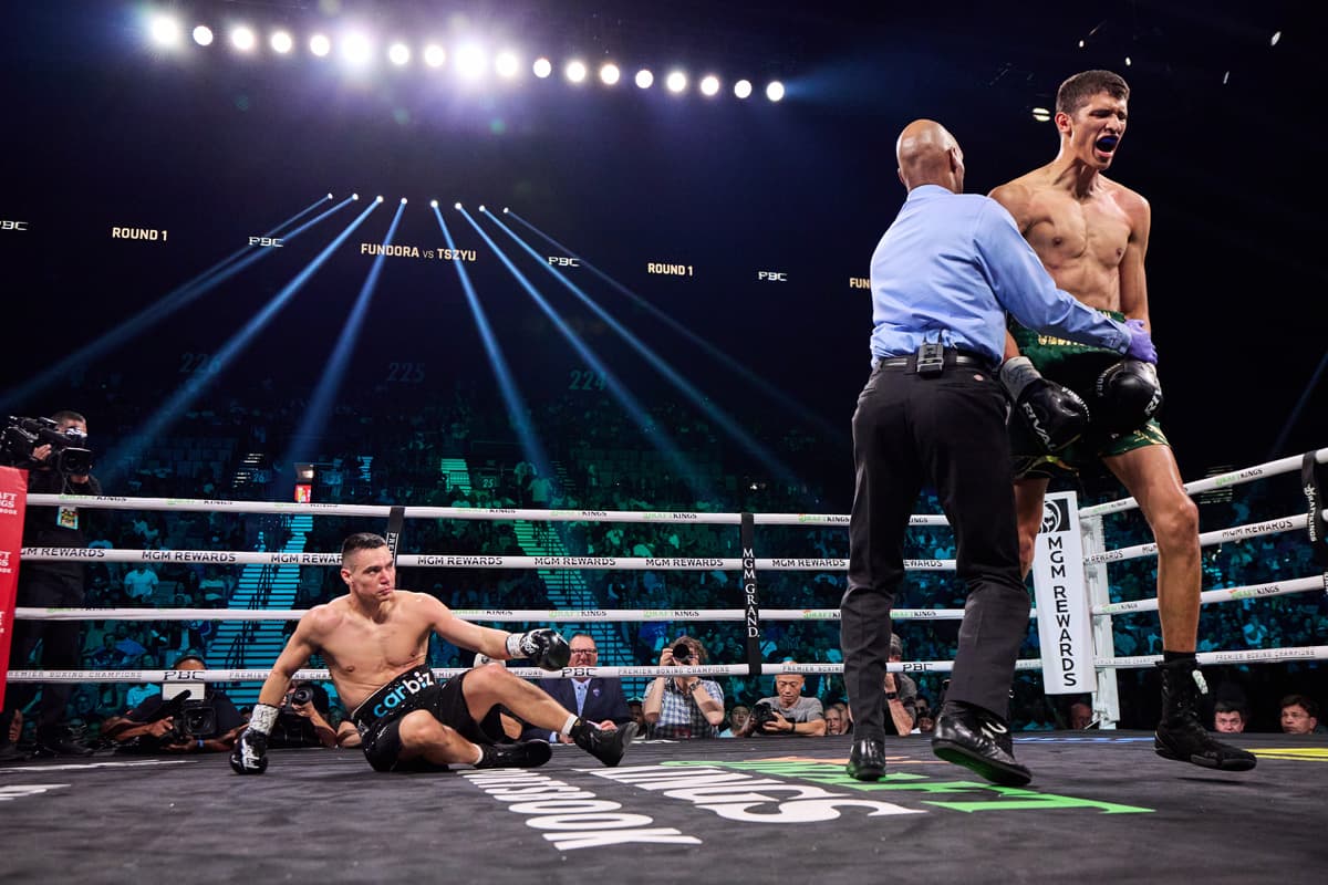 Sebastian Fundora knocks down Tim Tszyu during their bout at the MGM Grand Garden Arena in Las Vegas