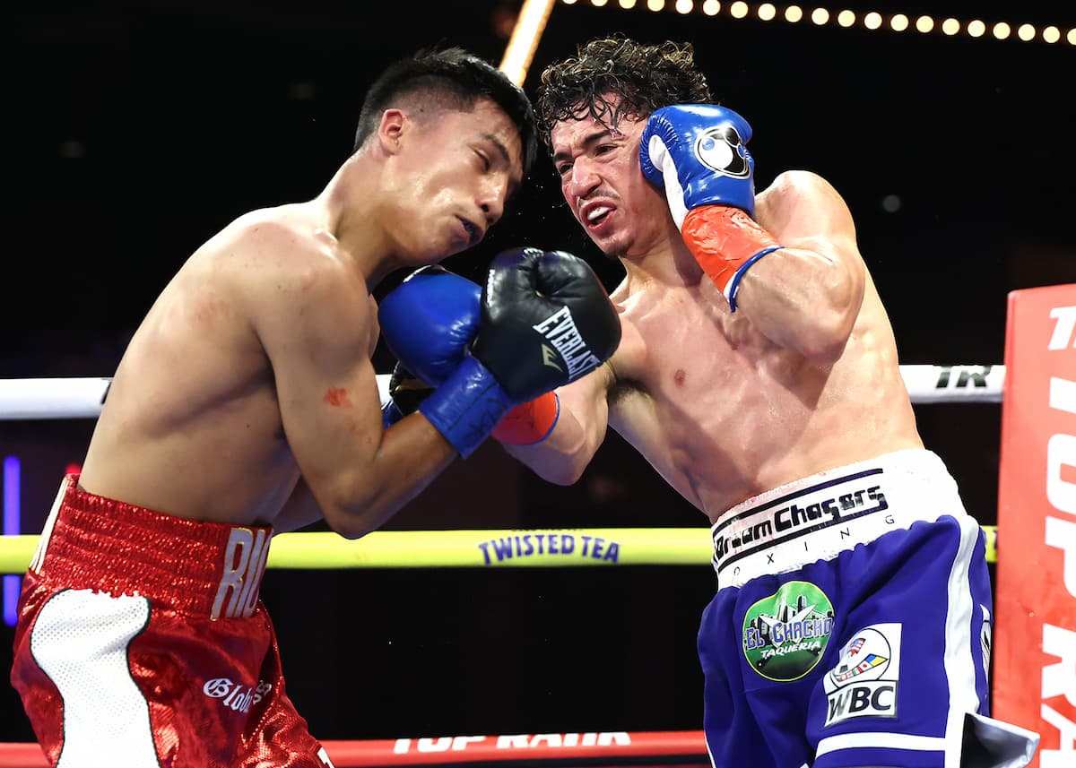 Steven Navarro punches Cristopher Rios during their bout at The Theater at Madison Square Garden in New York