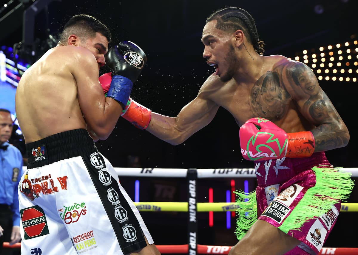 Yan Santana punches Aaron Alameda during their bout at The Theater at Madison Square Garden in New York