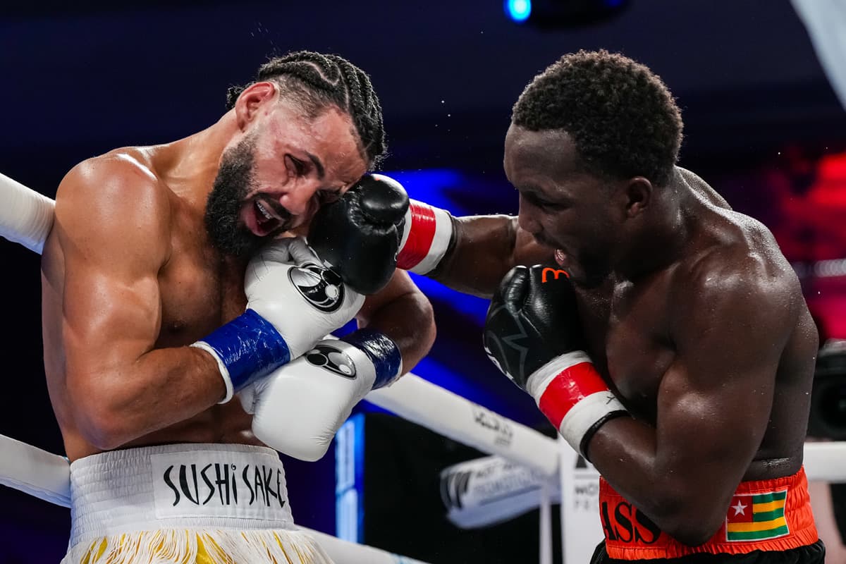 Abass Baraou punches Yoenis Tellez during their boxing bout at Caribe Royale Orlando