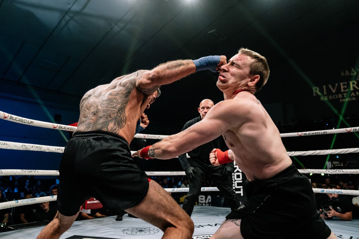 Adam De Freitas punches Skyler Mauller during their bout at BKFC Fight Night Edmonton