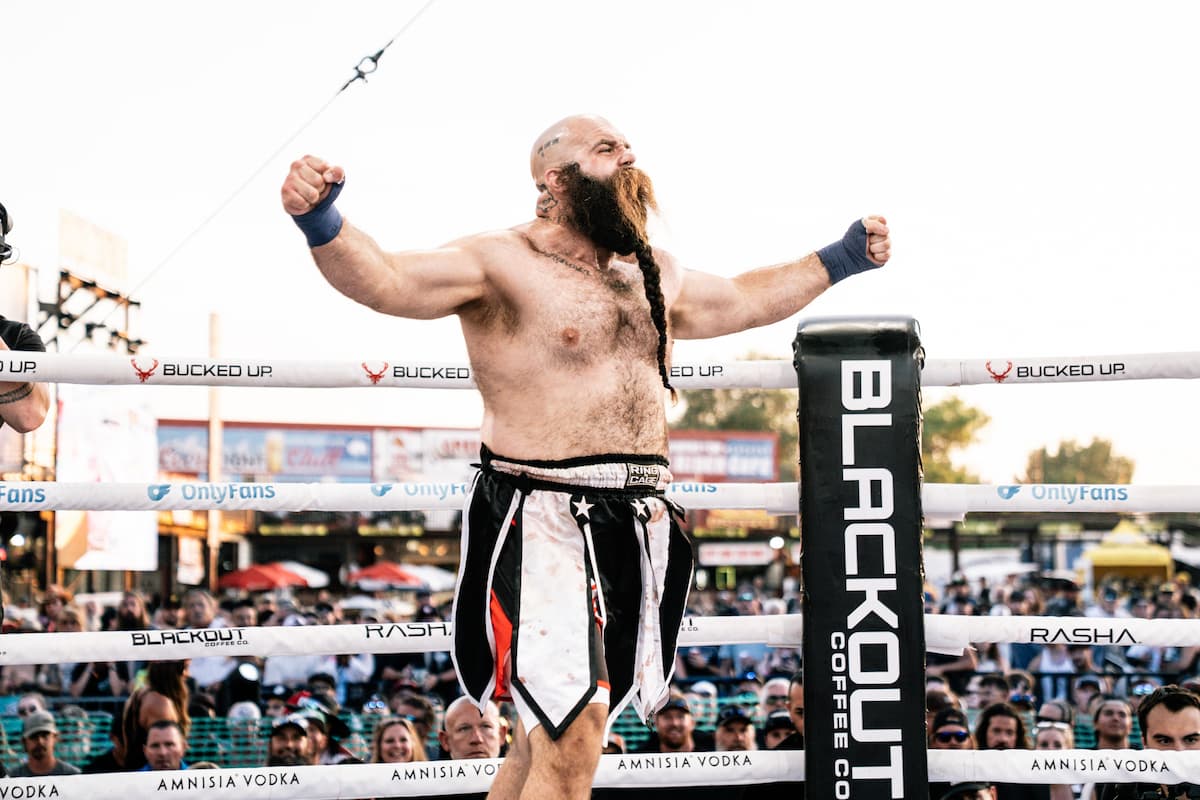 Bear Hill celebrates his victory over Billy Swanson at the Legendary Sturgis Buffalo Chip in Sturgis, SD