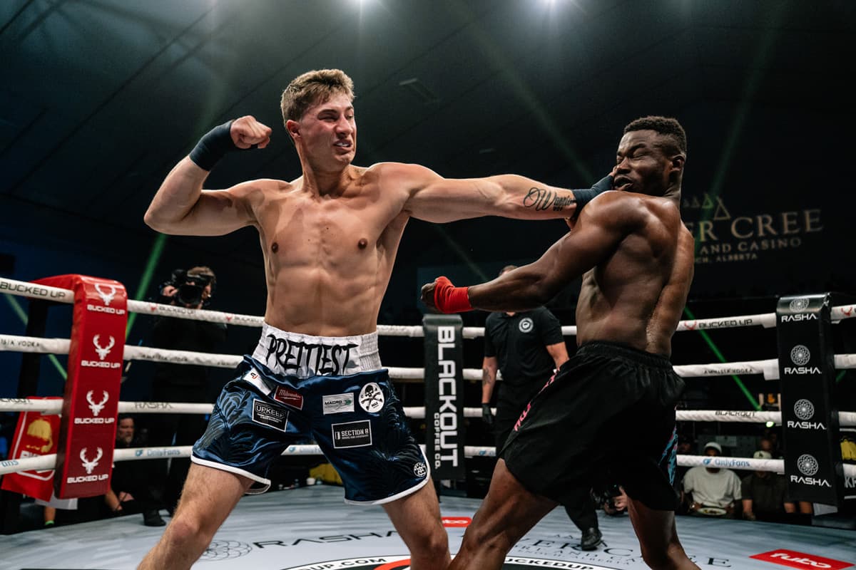 Caeden Scott punches Justin Kennedy during their bout at BKFC Fight Night Edmonton